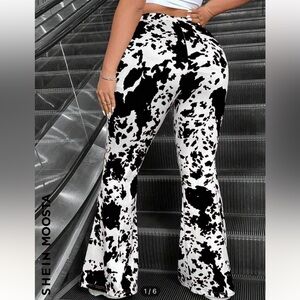 Black and White Cow Print Flared Pants